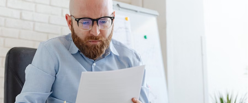 A policy owner reviewing rule logic