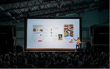 A presentation screen showing classification rules to an audience