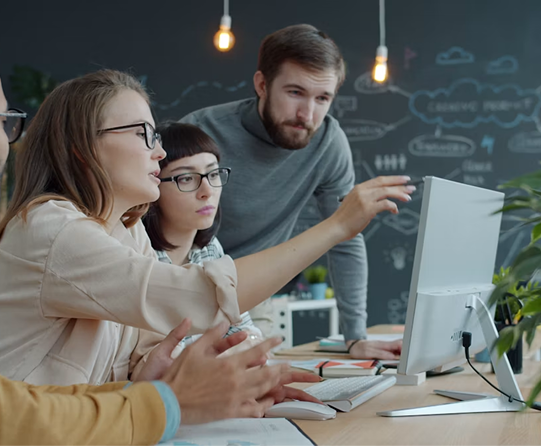 A team reviewing an explainable ZoikoTime recommendation path on a shared display