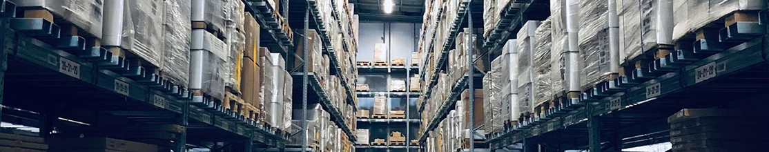 Racked inventory aisles in a scheduled-site operation